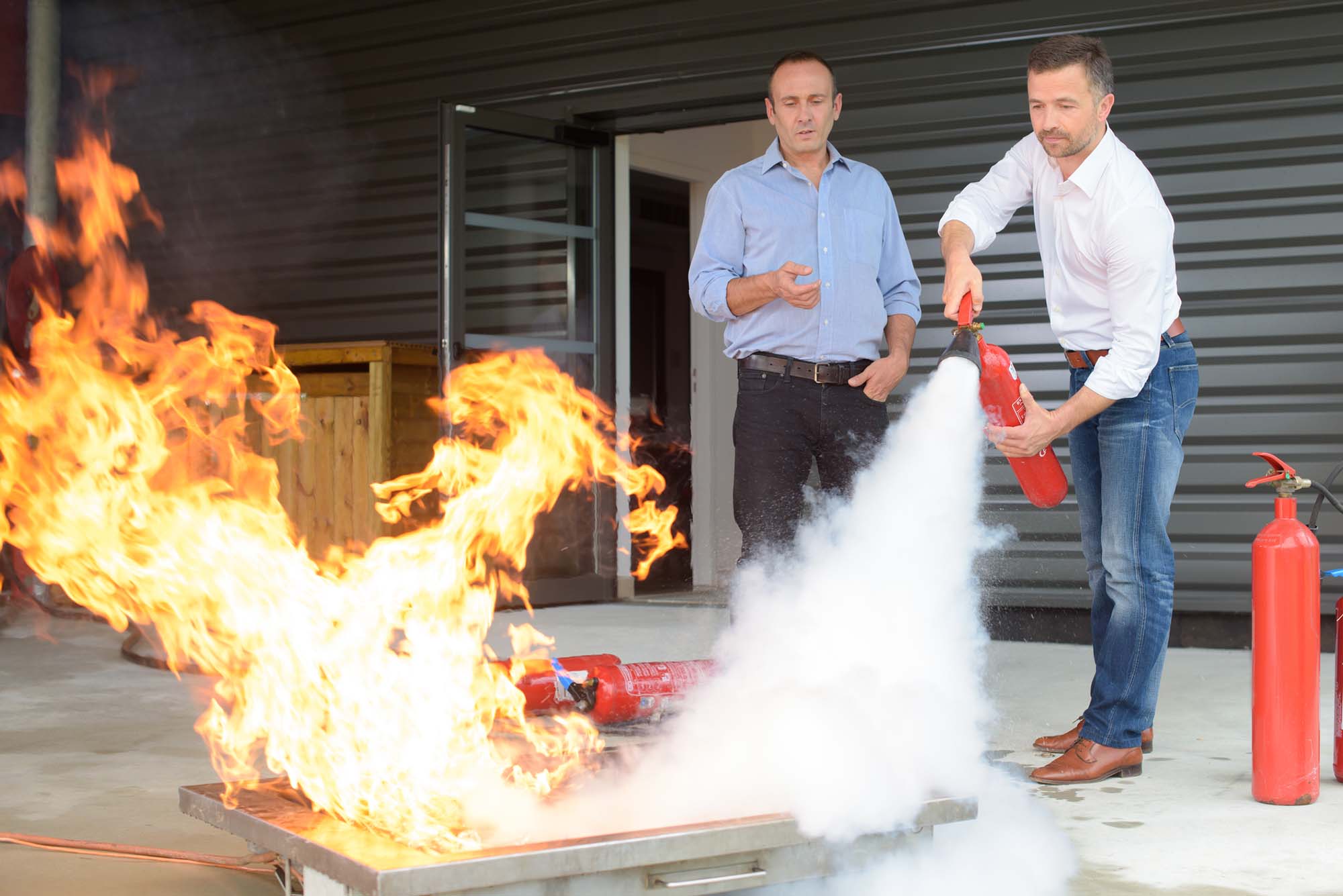 Learning to use the fire extinguisher
